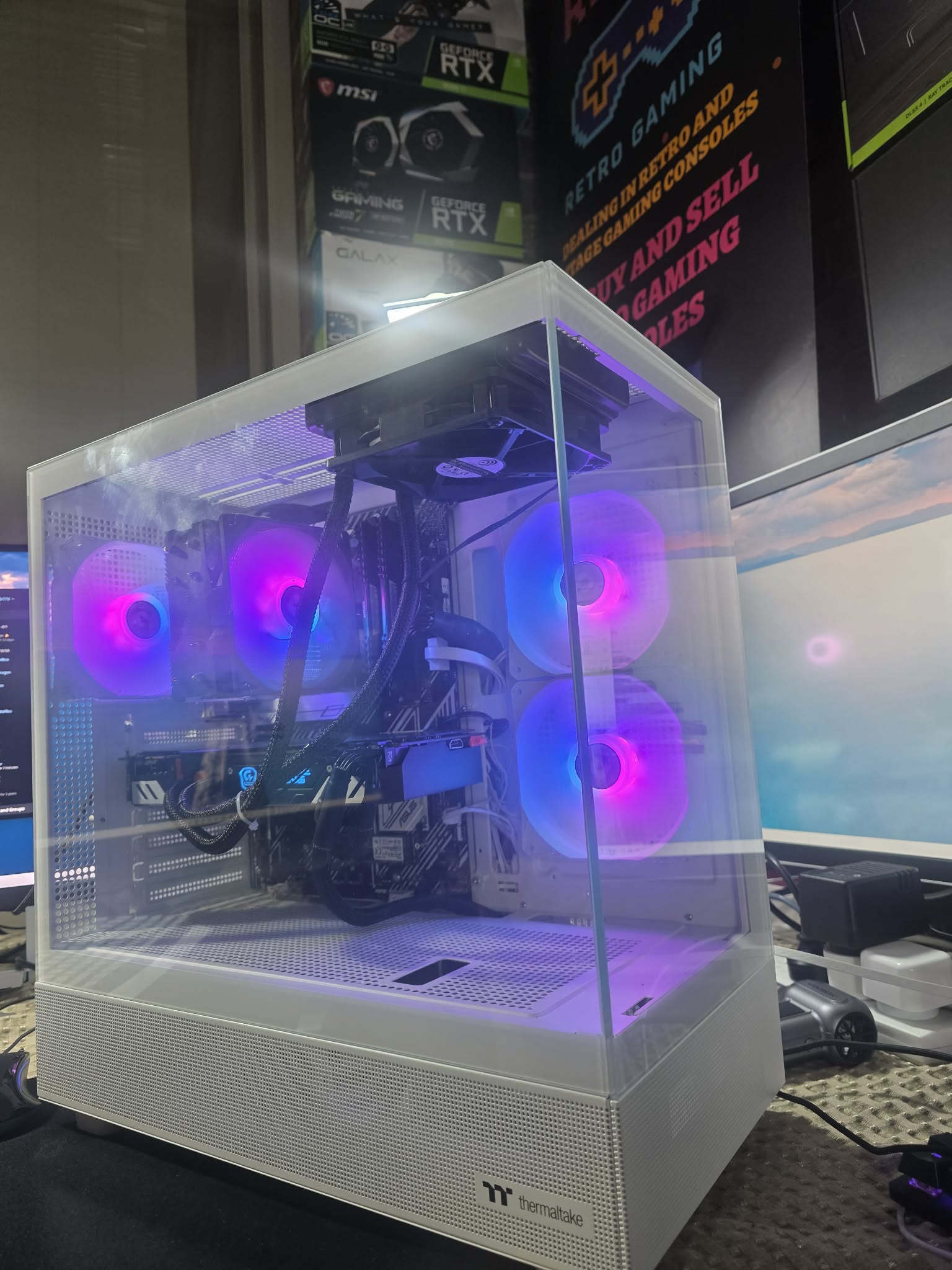 White panoramic case with purple-lit cooling.