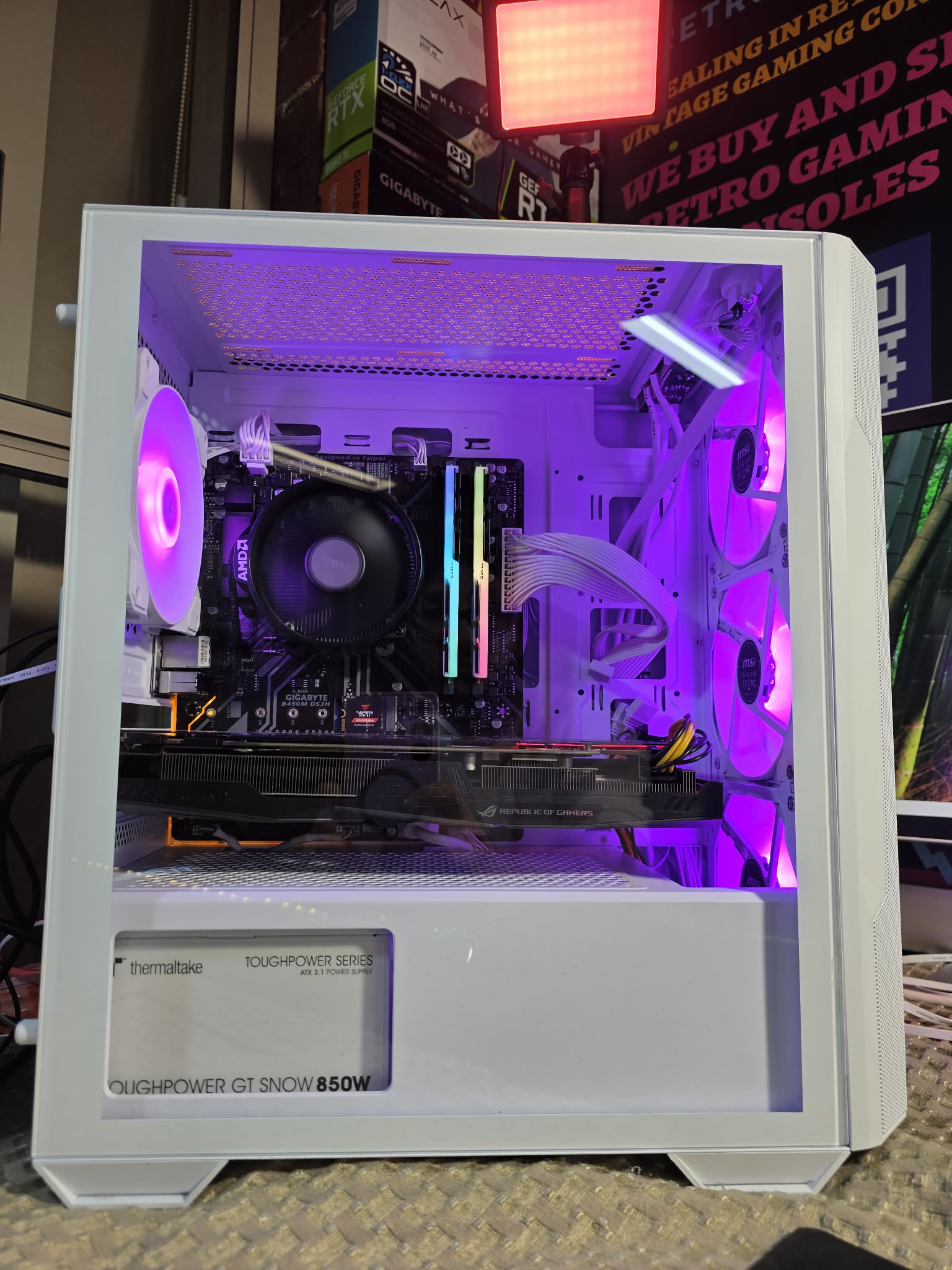 White cable extensions and colourful memory inside a white build.