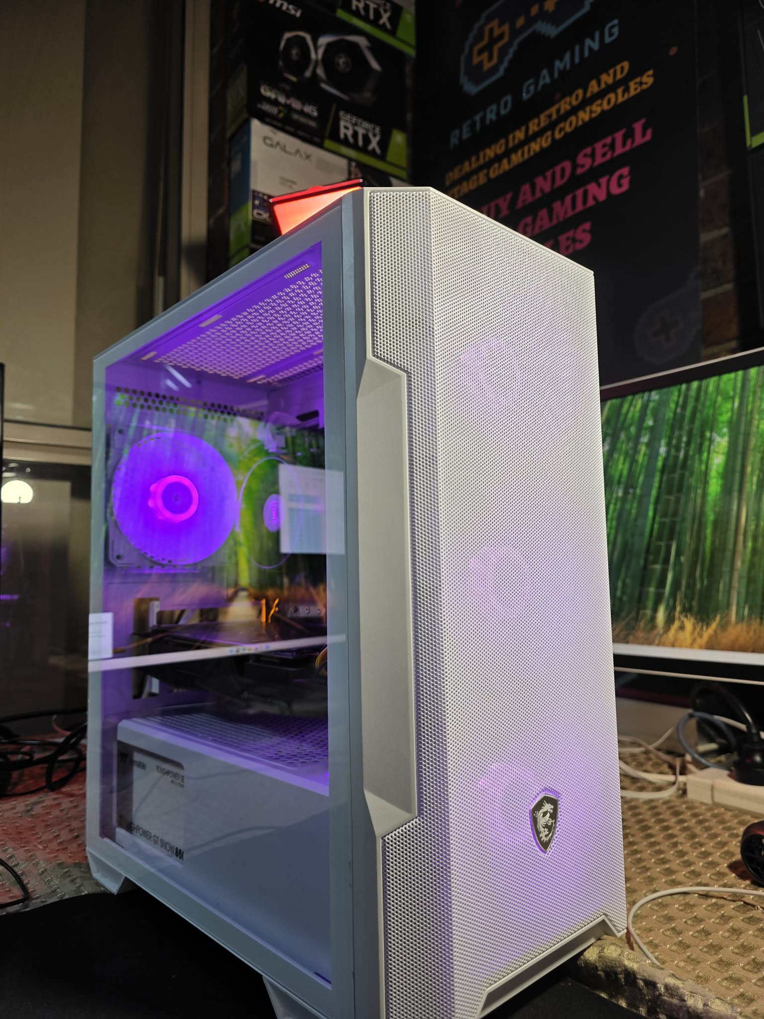 White FixItUp gaming tower with purple lighting
